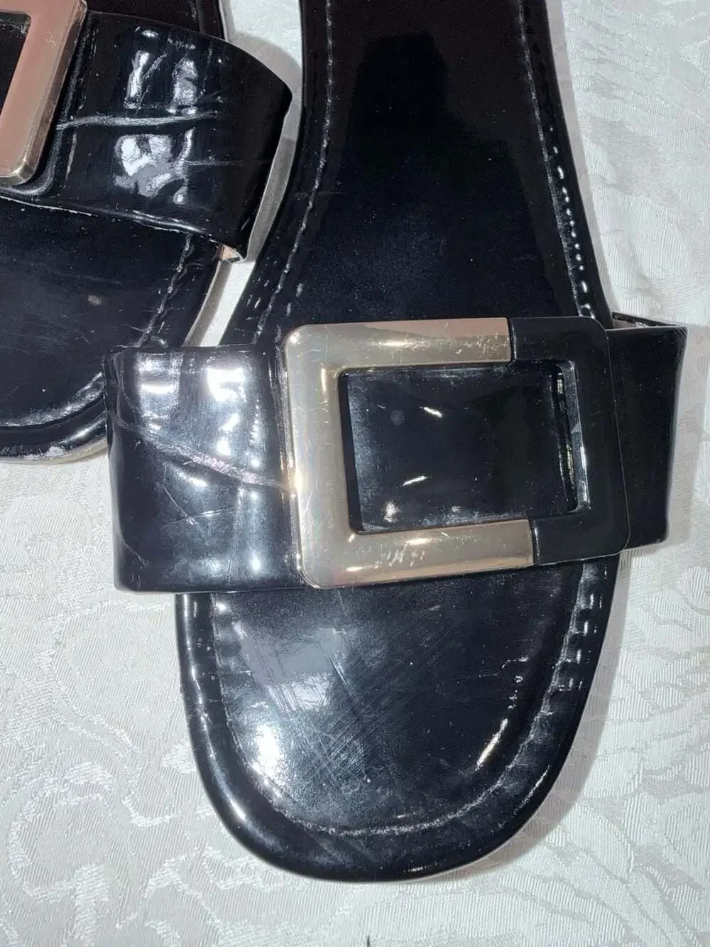Black Patent Leather Slip-On Flat Sandals with Gold Buckle Accent